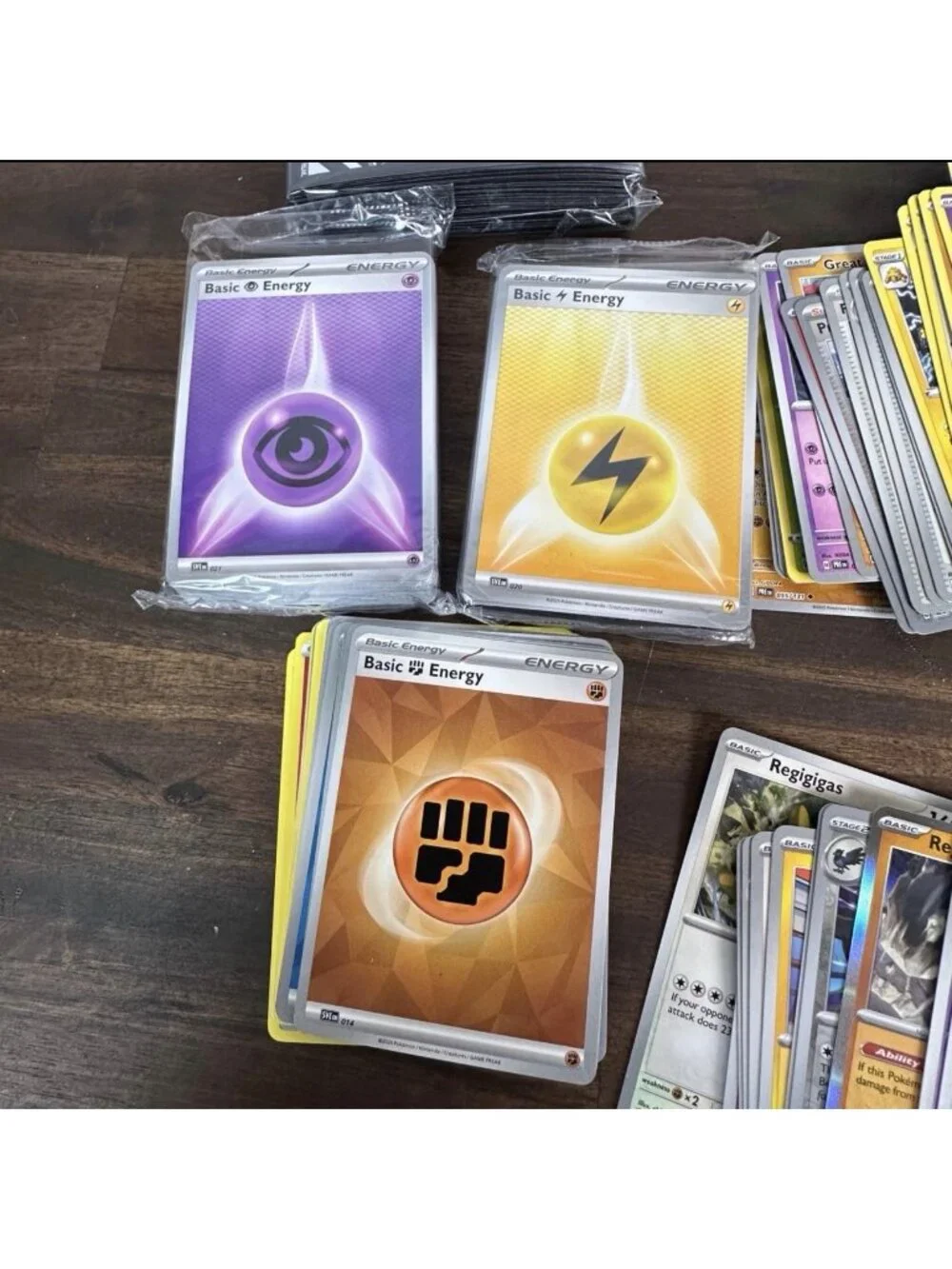 337 POKEMON cards + energy & protective sleeves.